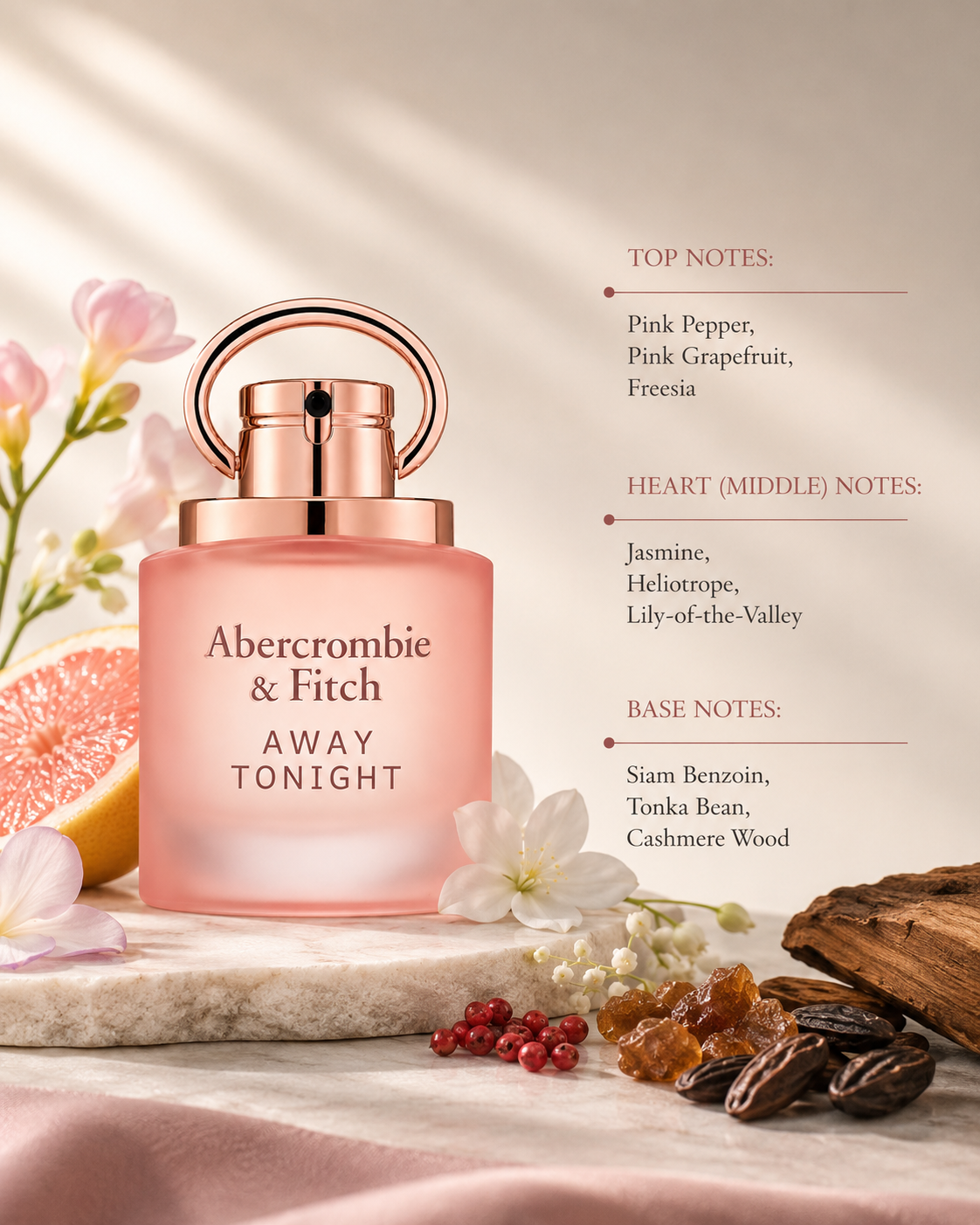 Abercrombie & Fitch Away Tonight 100ml EDP for Women displayed with pink grapefruit, freesia, jasmine, tonka bean and cashmere wood, highlighting its floral woody fragrance.