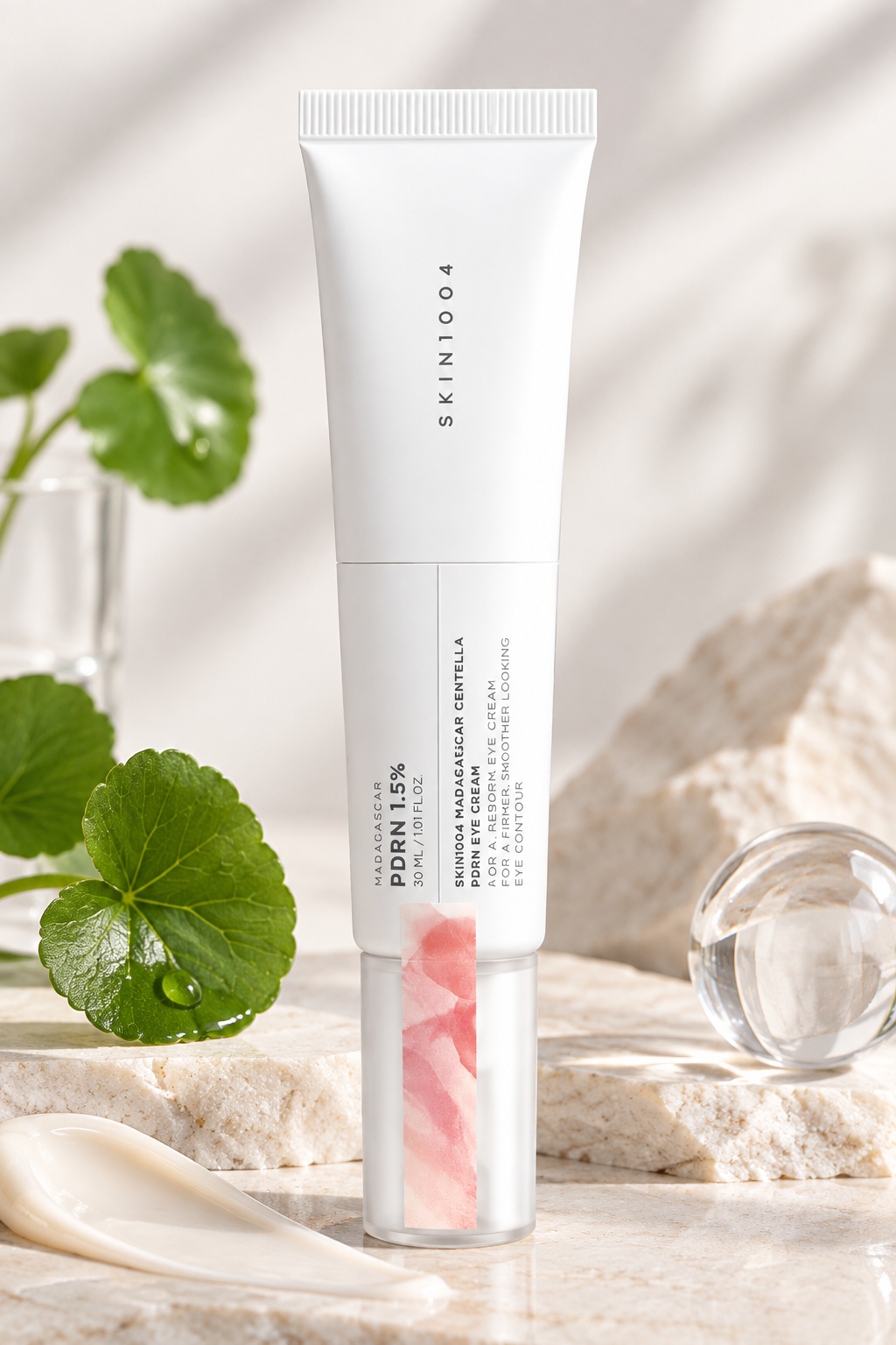 SKIN1004 Madagascar Centella PDRN 1.5 Cream 30ml displayed with fresh Centella leaves, water droplets, natural stone and a creamy texture swatch, highlighting its hydrating, firming and smoothing skincare benefits.